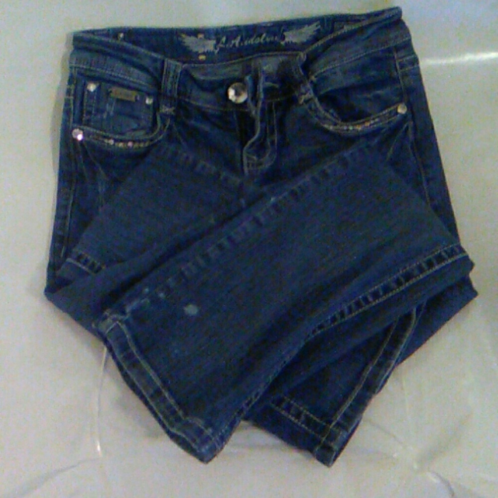 Boot cut jeans with very very small rips